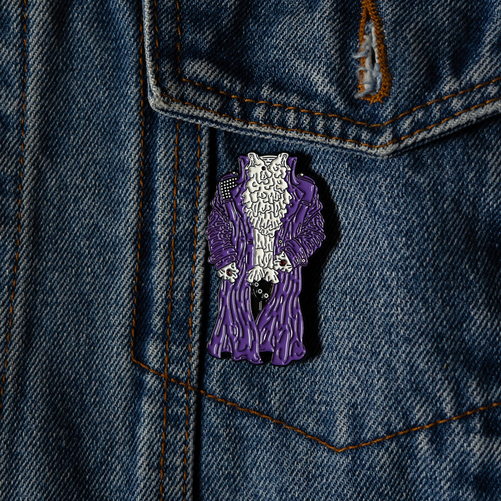 purple raun jacket enamel pin attached to a denim jacket