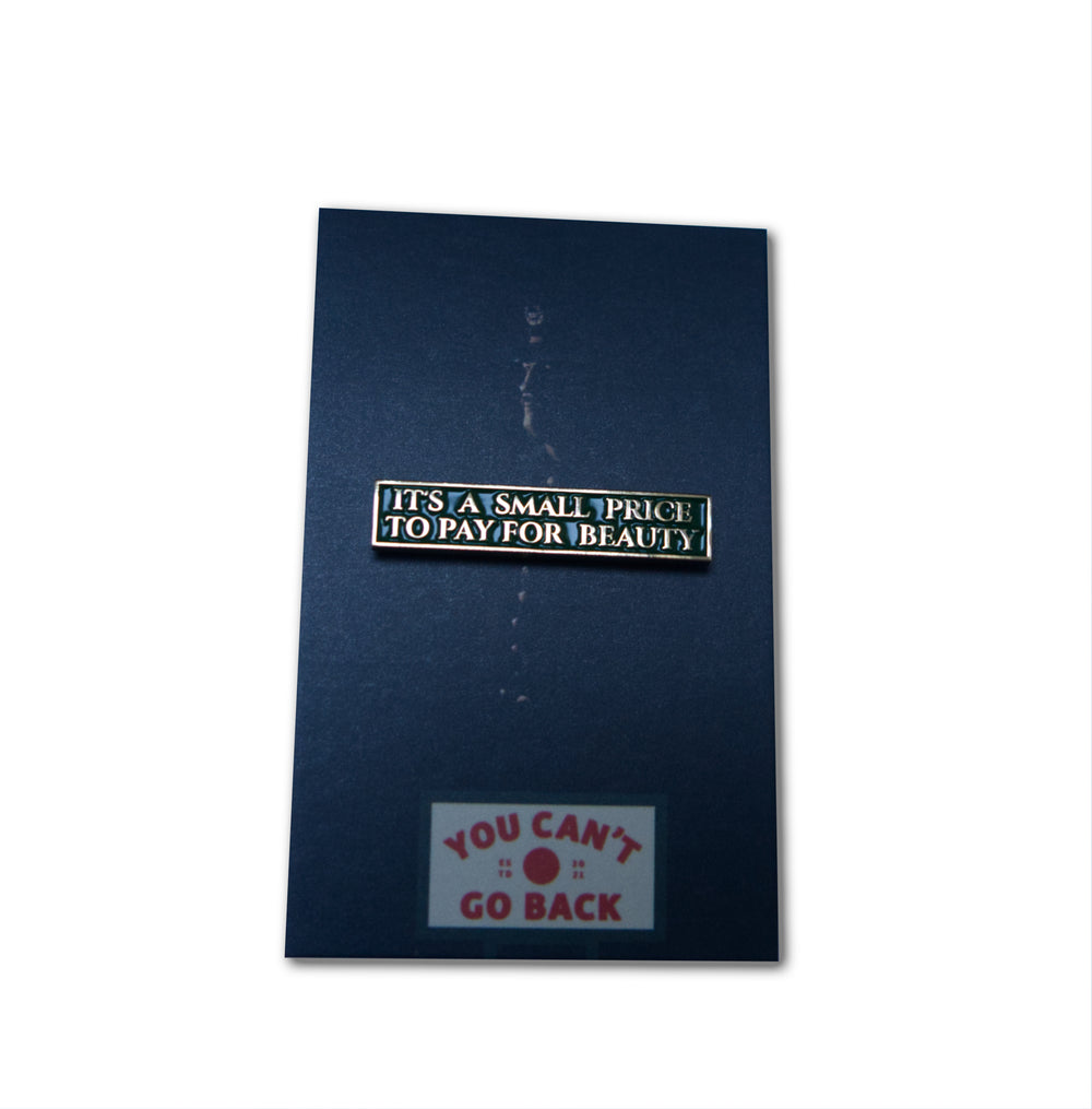 Butch Cassidy and the Sundance Kid Enamel Pin “It’s a Small Price for Beauty” on backing card
