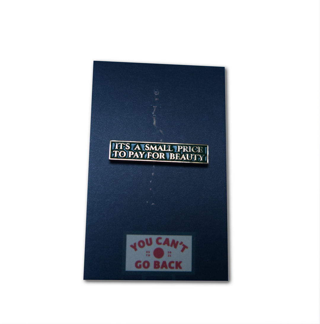 Butch Cassidy and the Sundance Kid Enamel Pin “It’s a Small Price for Beauty” on backing card
