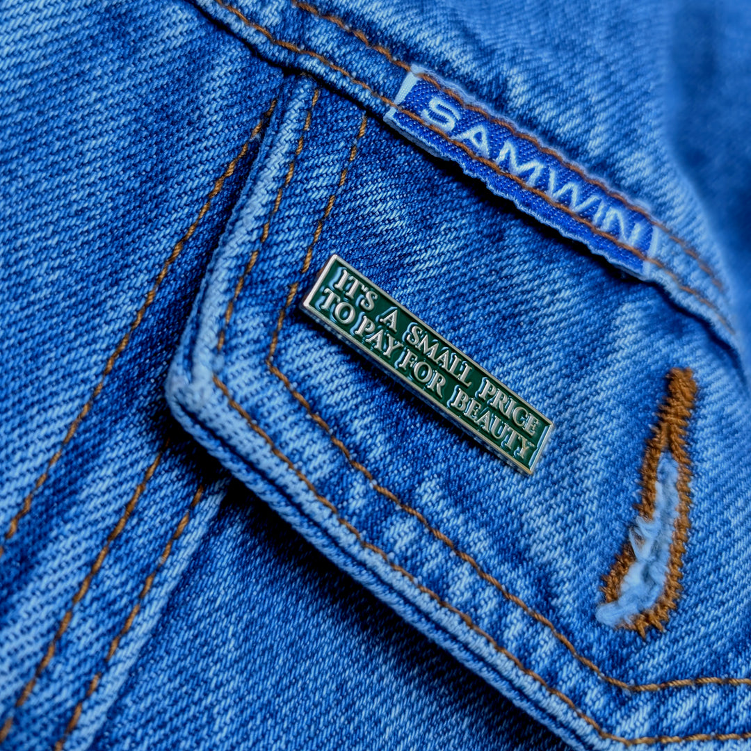 Butch Cassidy and the Sundance Kid Enamel Pin “It’s a Small Price for Beauty” on jacket
