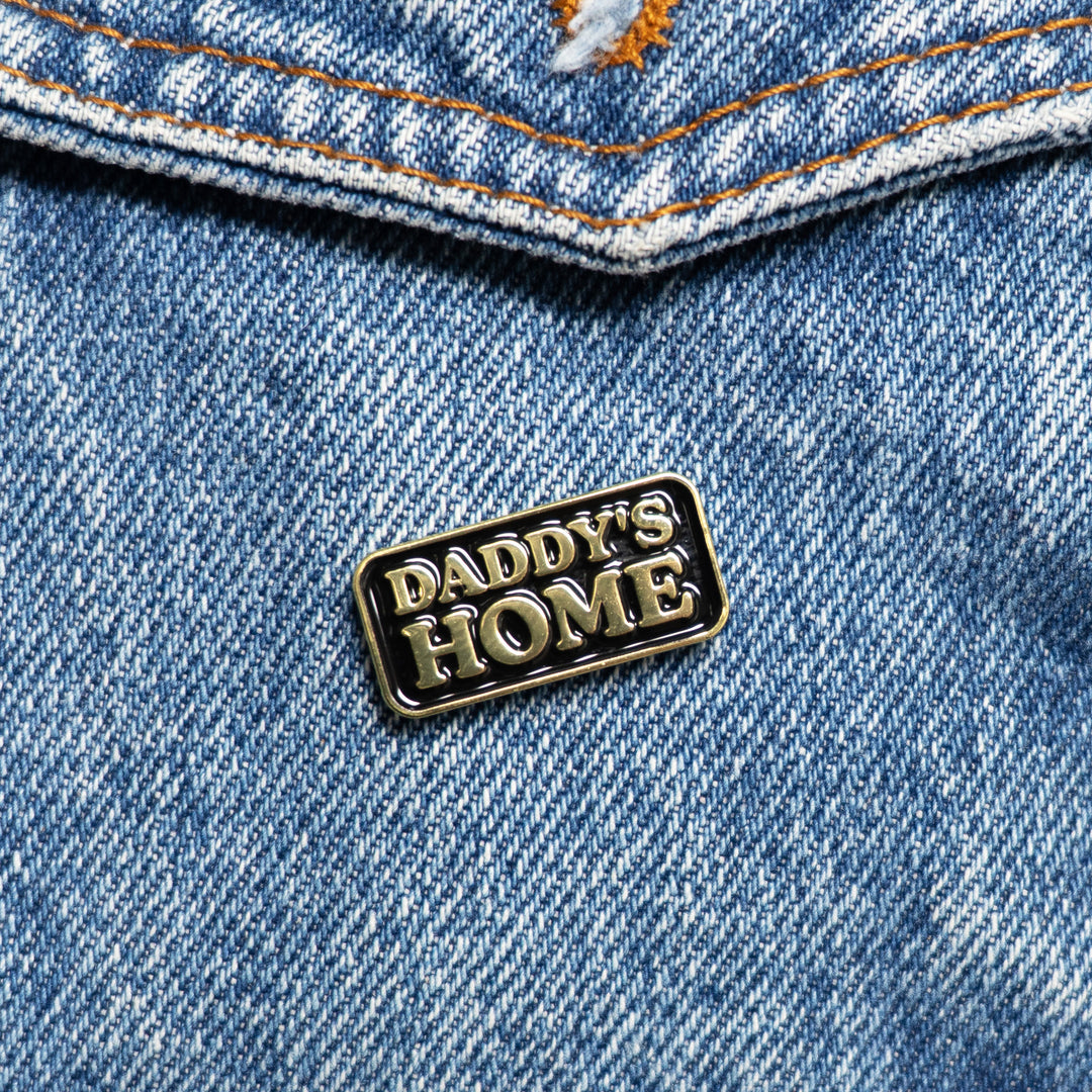 Daddy's Home Enamel Pin on jacket
