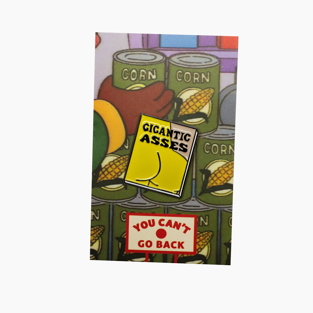 Gigantic Asses enamel Pin on backing card