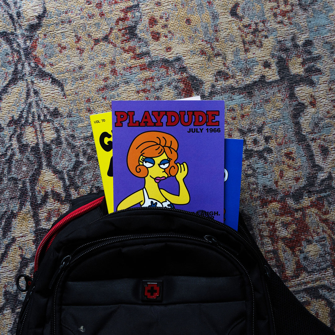 playdude notebook in a school bag