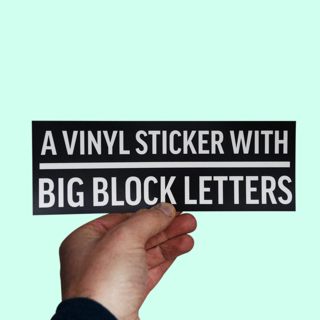 A Vinyl Sticker with Big Block Letters Sticker