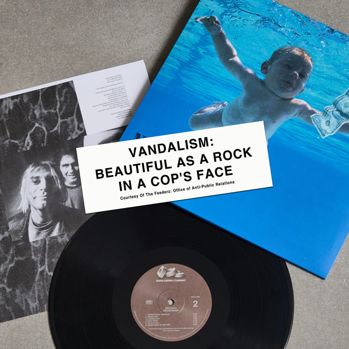  Kurt Cobain's guitar sticker on top of Nevermind album