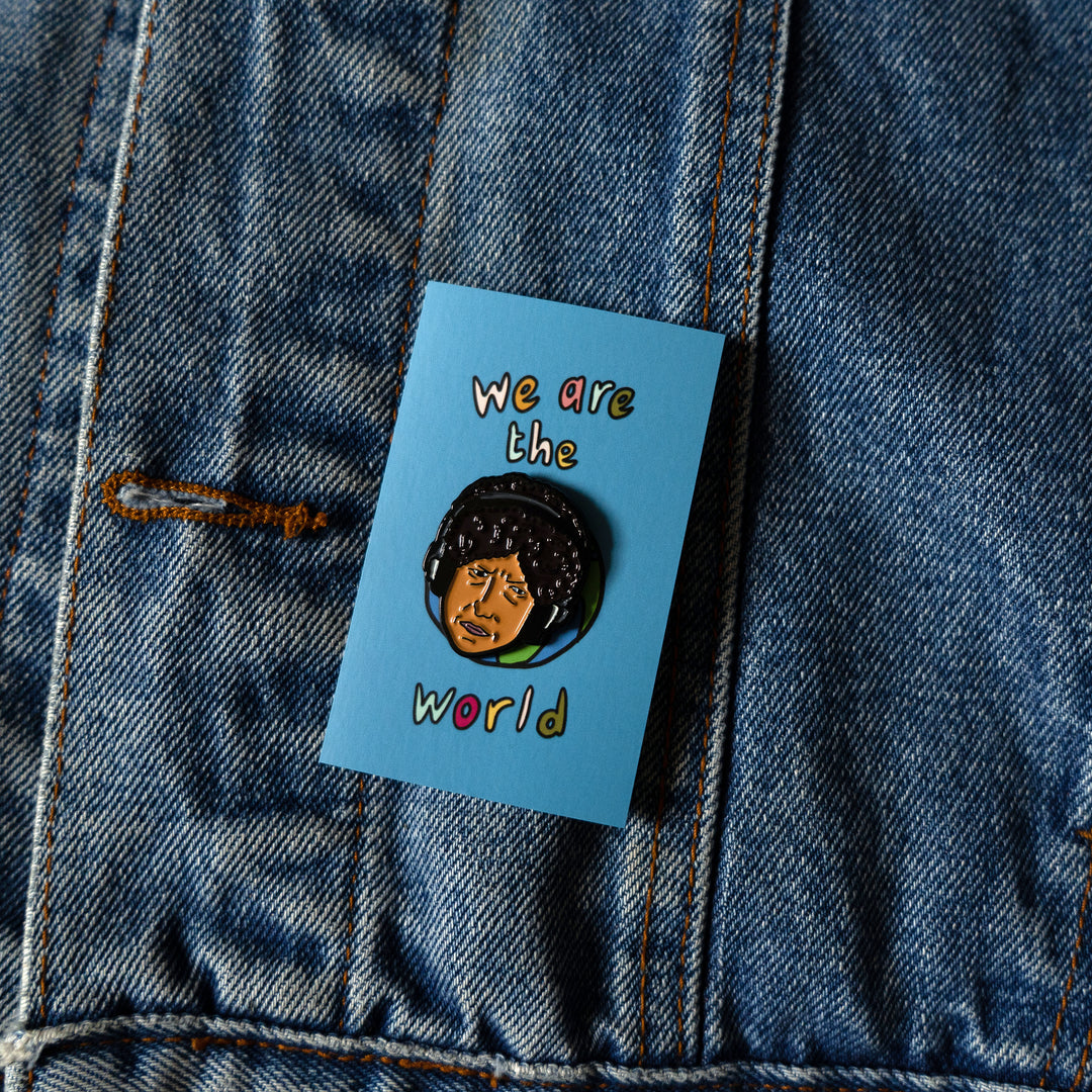 Bob Dylan We Are The World Pin on backing card, 